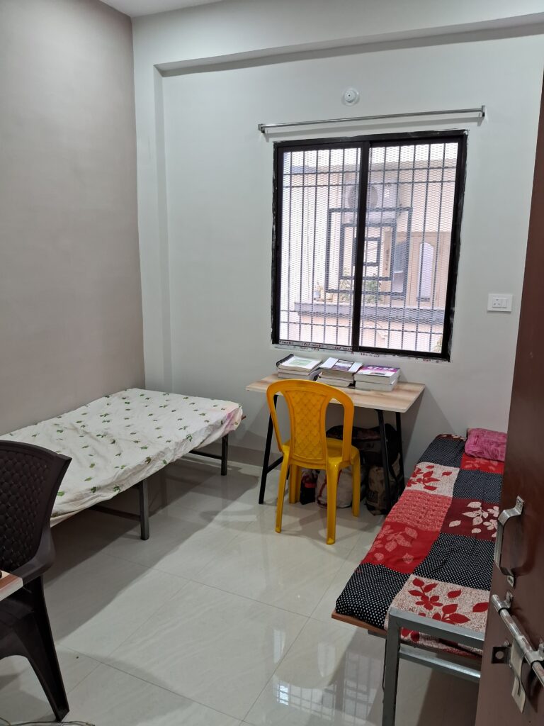 Double Non-AC Rooms being prepared for students at best Boys Hostel in Boring Road, Patna